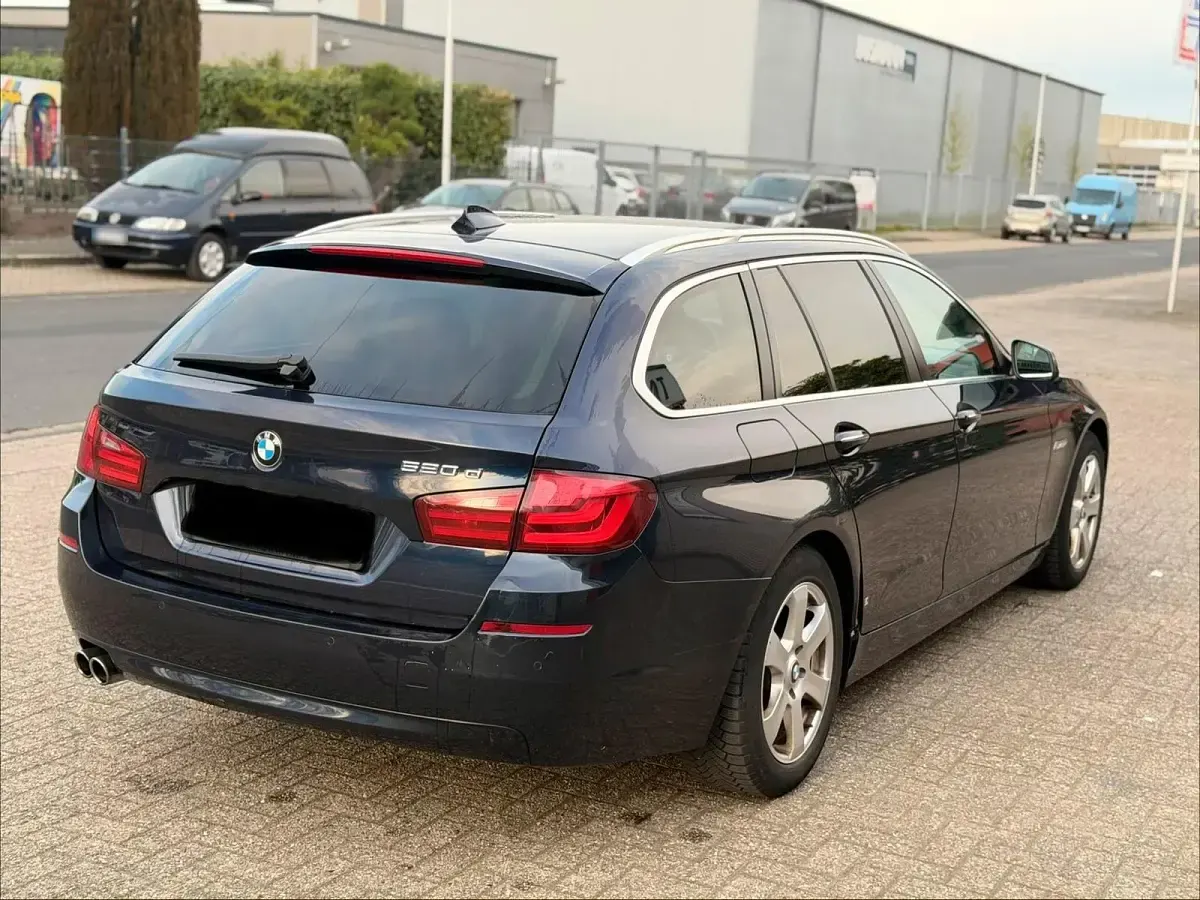 Gebraucht BMW 520 184 PS (135 kW) 2011 Blau Kombi