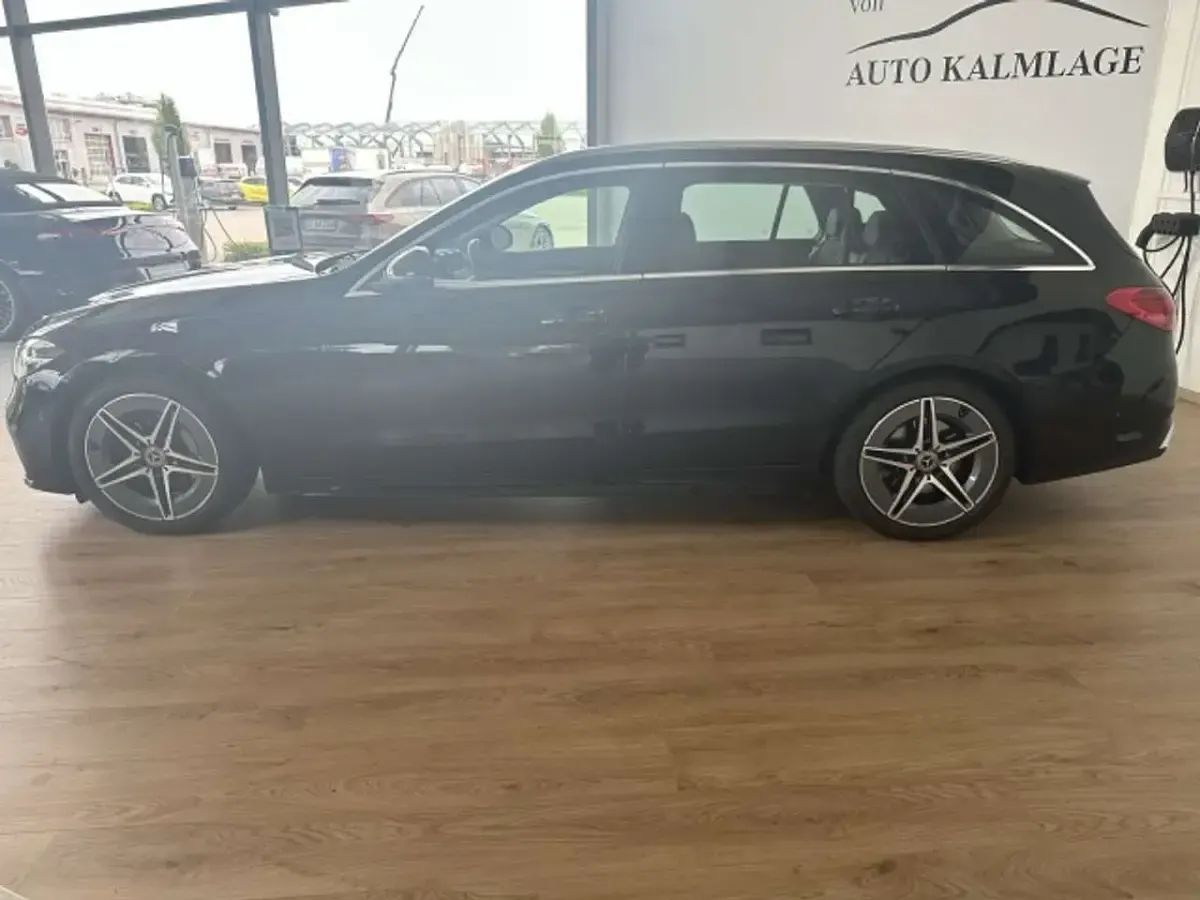 Gebraucht Mercedes C220 AMG line 200 PS (147 kW) 2021 Obsidianschwarz Kombi