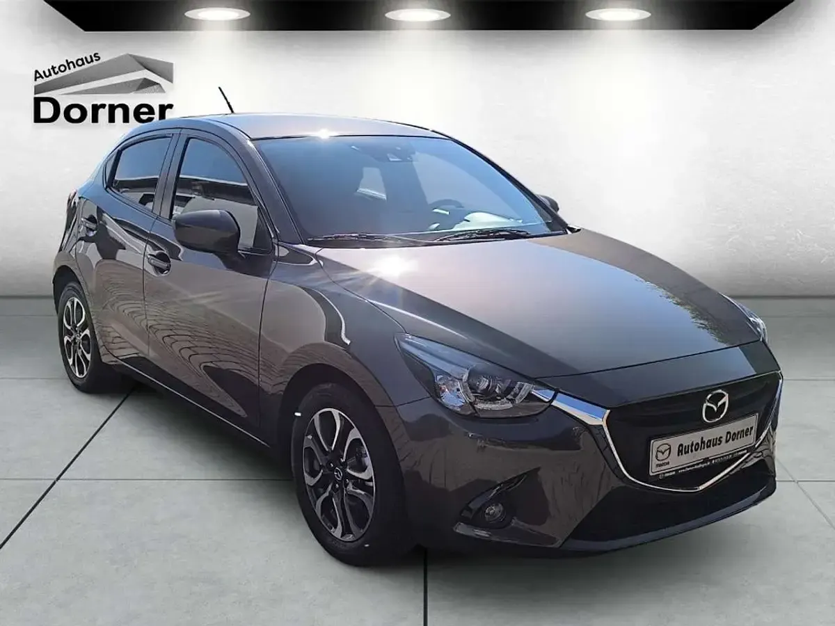 Gebraucht Mazda 2 Nakama 90 PS (66 kW) 2016 Obsidiangrau metallic Kleinwagen