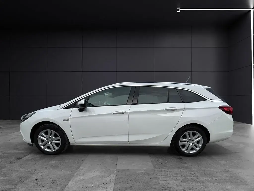 Gebraucht Opel Astra Dynamic 200 PS (147 kW) 2016 Schneeweiss/summitwhite/arctic Kombi