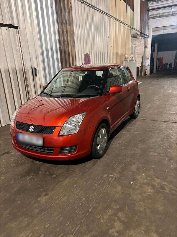 Gebraucht Suzuki Swift 92 PS (67 kW) 2010 Orange Kleinwagen