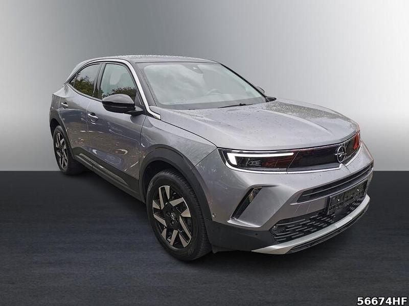 Gebraucht Opel Mokka Elegance 131 PS (96 kW) 2022 Kontrast grau/quarz silber SUV