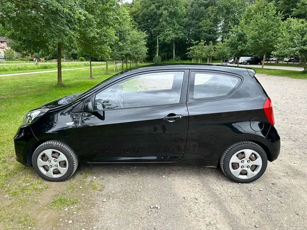 Gebraucht Kia Picanto Attract 69 PS (50 kW) 2012 Schwarz Kleinwagen
