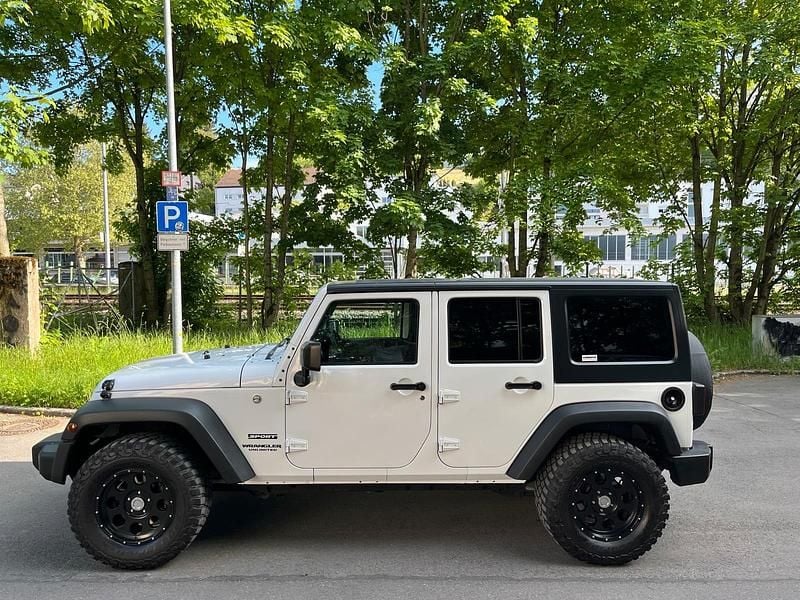 Weiß Gebraucht 2017 Jeep Wrangler Sport SUV | 32.500 € (Fairer Preis) - Bild 1/4