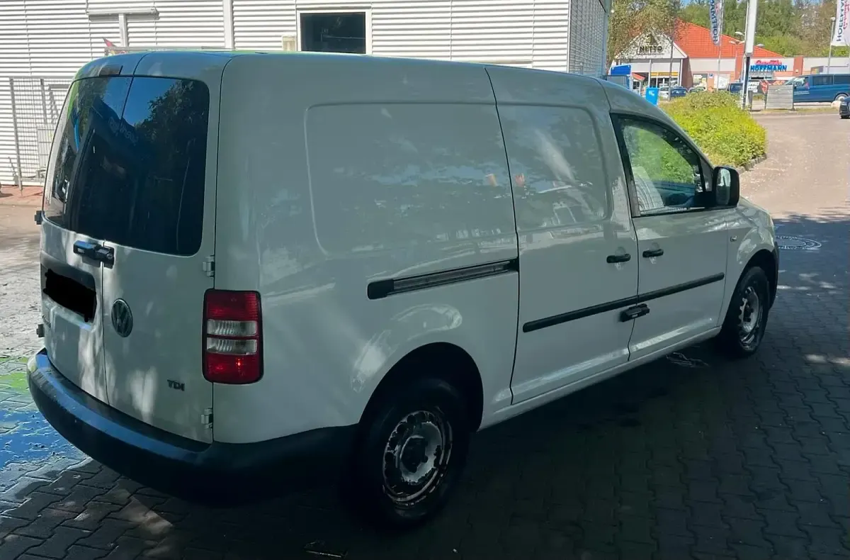 Używany VW Caddy 105 KM (77 kW) 2014 Biały Minivan