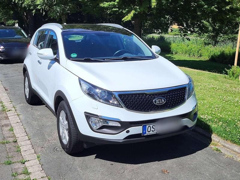 Weiß Gebraucht 2015 Kia Sportage Vision SUV | 9.900 € (Fairer Preis) - Bild 1/4