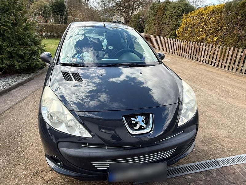 Gebraucht Peugeot 206 70 PS (51 kW) 2012 Grau Kleinwagen