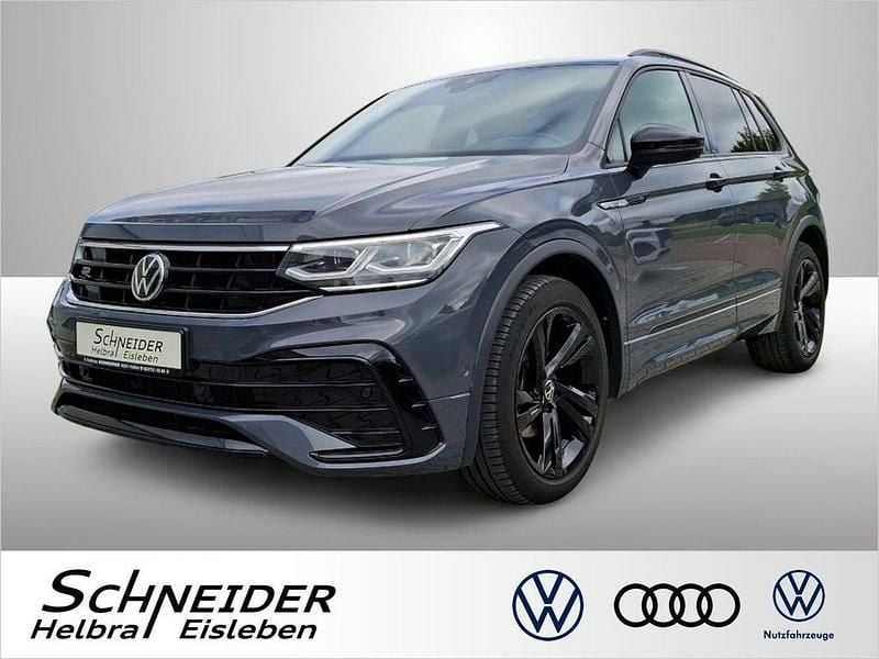 Delfingrau (metallic) Gebraucht 2021 VW Tiguan R-line SUV | 26.840 € (Superpreis) - Bild 1/4