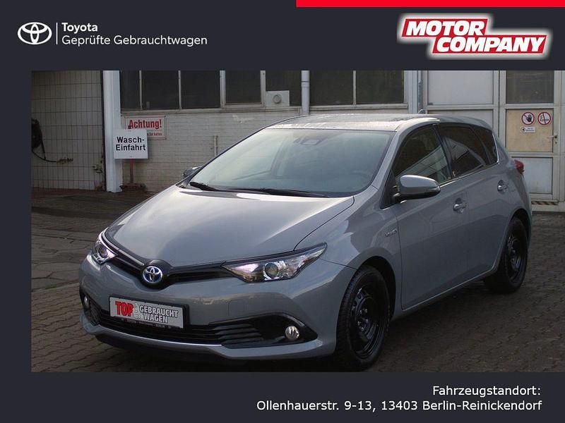 Manhattengrau metallic Gebraucht 2018 Toyota Auris Hybrid Basis Limousine | 17.450 € (Fairer Preis) - Bild 1/4