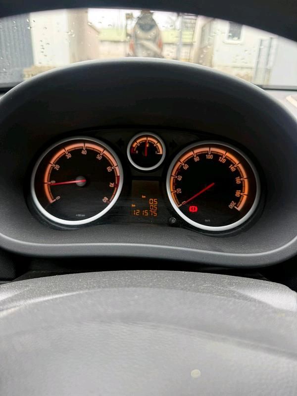 Second-hand Opel Corsa 60 CP (44 kW) 2006 Auriu Hatchback