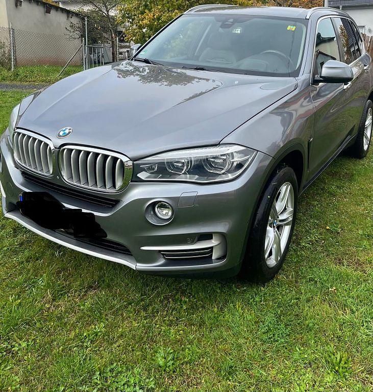 Grau Gebraucht 2015 BMW X5 Performance SUV | 26.490 € (Teuer) - Bild 1/4