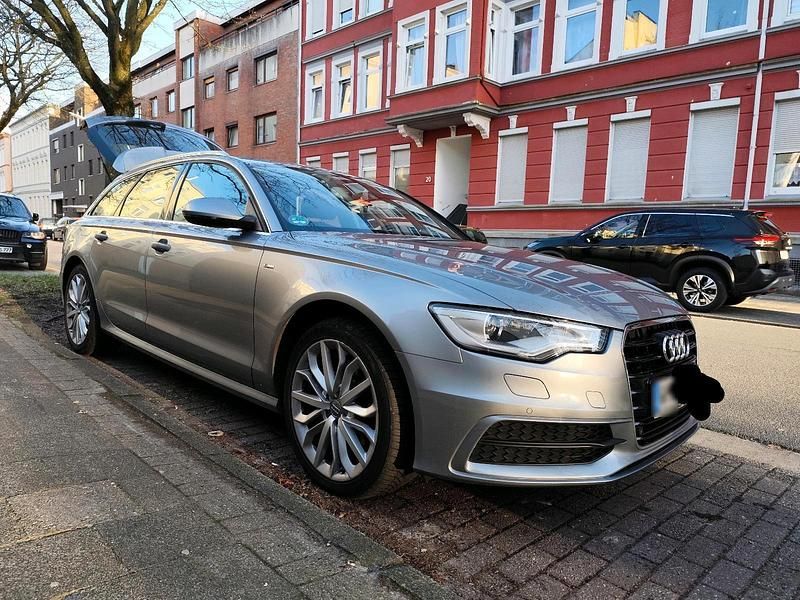 Używany Audi A6 190 KM (139 kW) 2014 Srebrny Kombi
