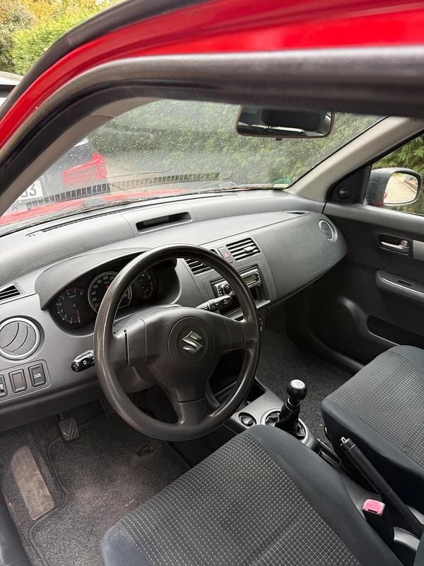 Rot Gebraucht 2008 Suzuki Swift Kleinwagen | 1.650 € - Bild 1/4