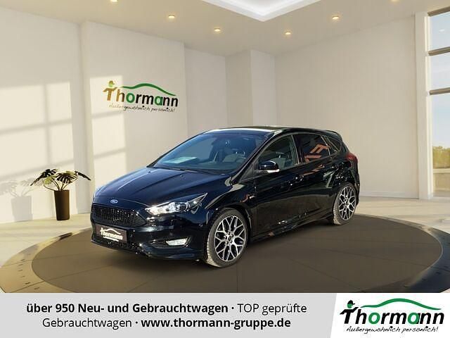 Iridiumschwarz Gebraucht 2018 Ford Focus ST-Line Limousine | 15.711 € (Teuer) - Bild 1/2