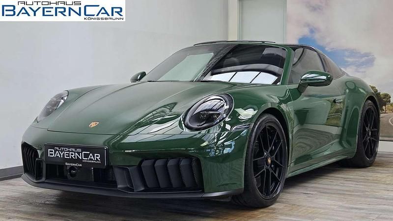 Gebraucht Porsche 992 541 PS (397 kW) 2025 Sonderlackierung irishgreen Coupé