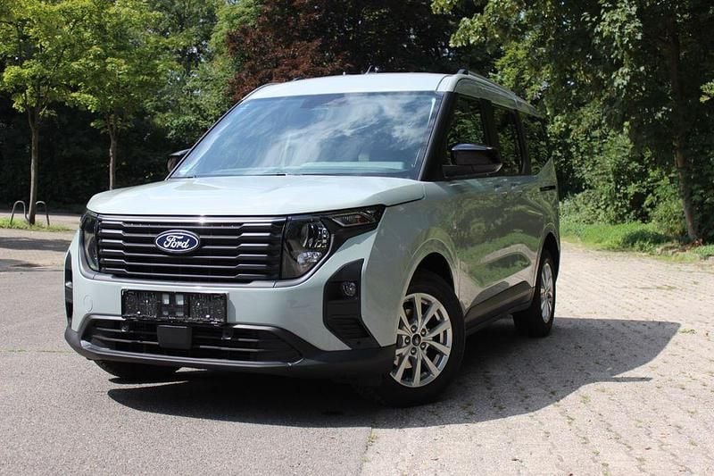 Grau Gebraucht 2024 Ford Tourneo Courier Titanium Van / Kleinbus | 23.750 € (Superpreis) - Bild 1/4