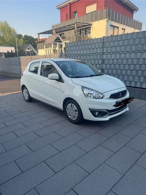 Weiß Gebraucht 2018 Mitsubishi Space Star Kleinwagen | 5.300 € (Fairer Preis) - Bild 1/4
