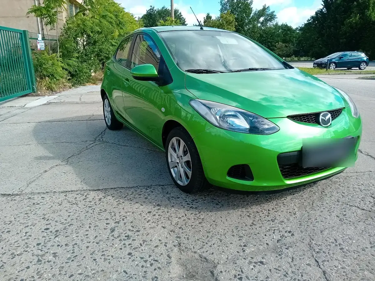 Gebraucht Mazda 2 75 PS (55 kW) 2009 Grün Kleinwagen