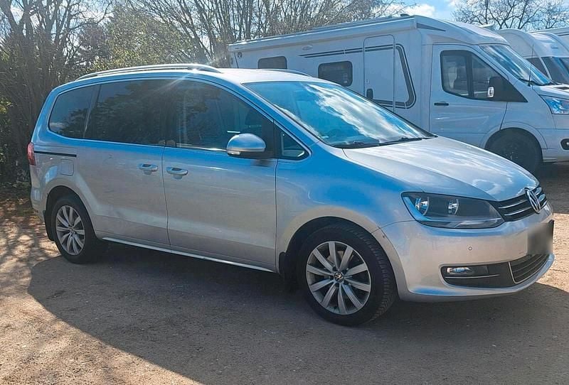 Second-hand VW Sharan 140 CP (102 kW) 2012 Argintiu Monovolum