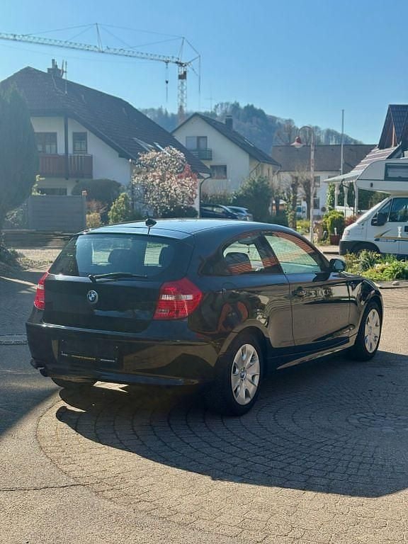 Używany BMW 116 122 KM (89 kW) 2008 Czarny Hatchback
