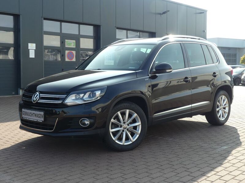 Deep black perleffekt Gebraucht 2016 VW Tiguan LOUNGE SUV | 16.590 € (Fairer Preis) - Bild 1/4