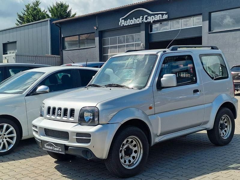 Silber Gebraucht 2011 Suzuki Jimny Club SUV | 11.699 € (Fairer Preis) - Bild 1/4
