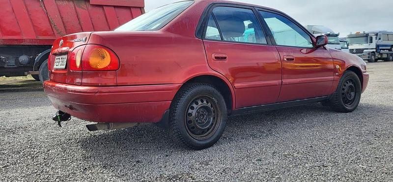 Gebraucht Toyota Corolla 110 PS (80 kW) 2000 Rot Limousine