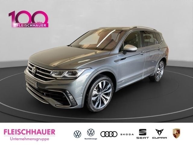 Grau Gebraucht 2023 VW Tiguan Allspace R-line SUV | 45.590 € (Etwas zu teuer) - Bild 1/4