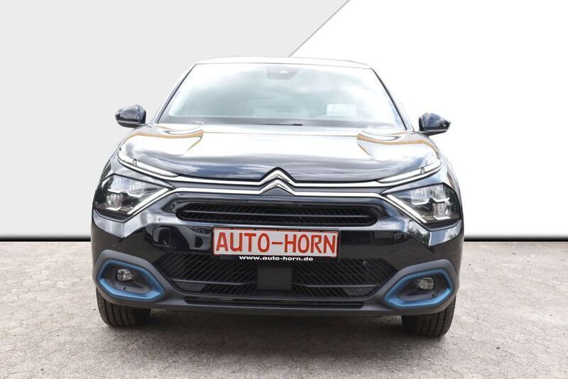 Gebraucht Citroën e-C4 Shine 100 kW (136 PS) 2024 Perla nera schwarz metallic Limousine