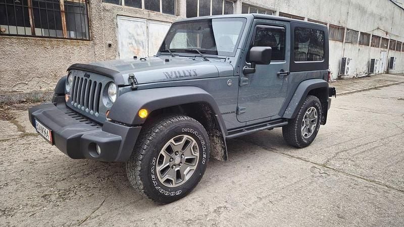 Grau Gebraucht 2014 Jeep Wrangler Sahara SUV | 16.900 € (Superpreis) - Bild 1/4
