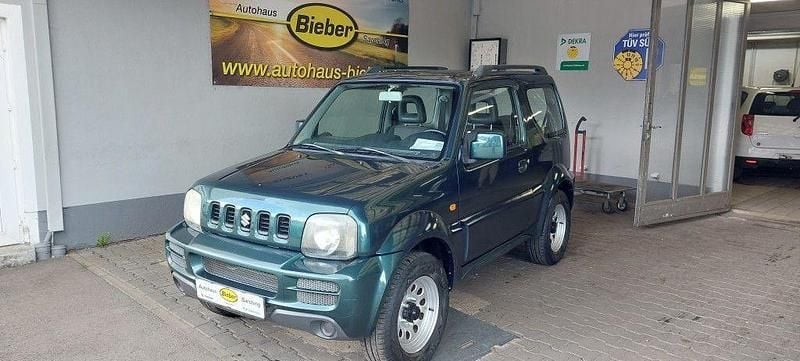 Grün Gebraucht 2005 Suzuki Jimny Club SUV | 3.950 € (Superpreis) - Bild 1/4