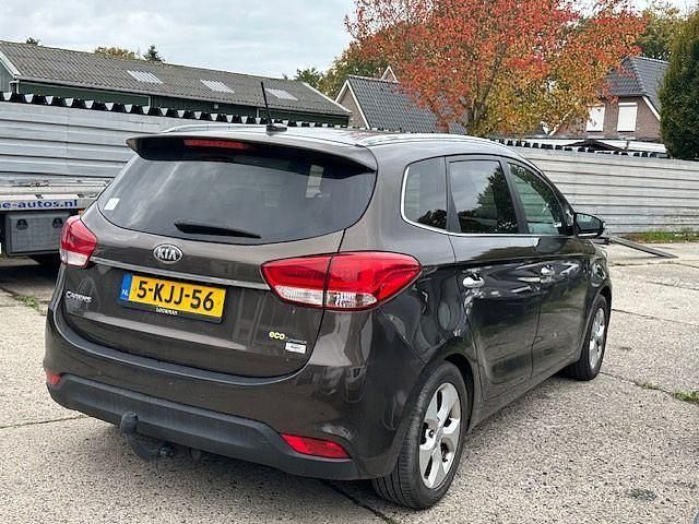 Gebraucht Kia Carens 135 PS (99 kW) 2013 Braun Van / Kleinbus