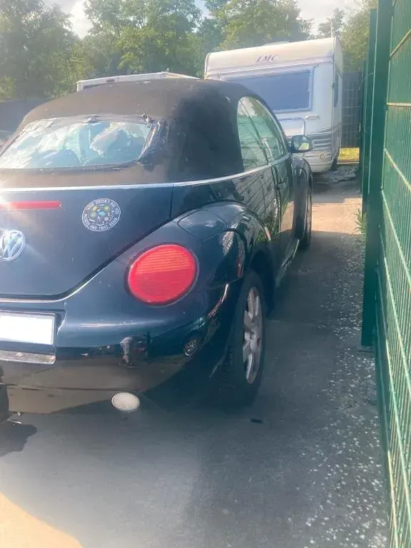 Gebraucht VW New Beetle 116 PS (85 kW) 2005 Schwarz Kleinwagen