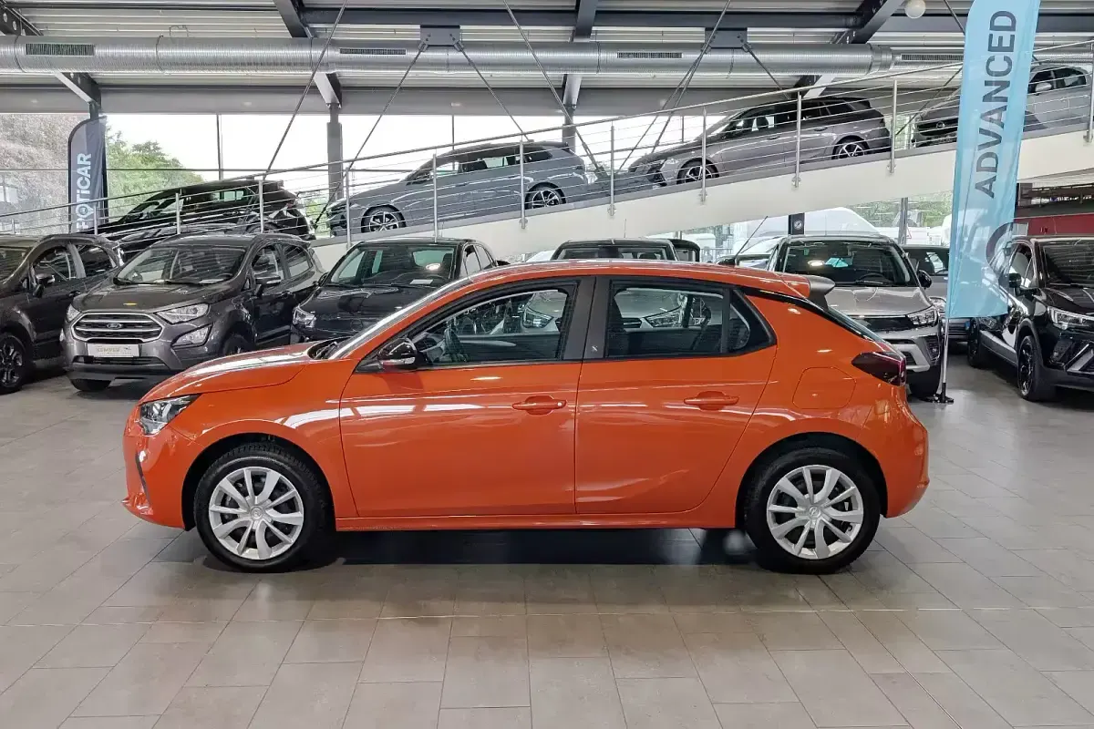 Gebraucht Opel Corsa-e Edition 100 kW (136 PS) 2022 Power orange (metallic) Kleinwagen