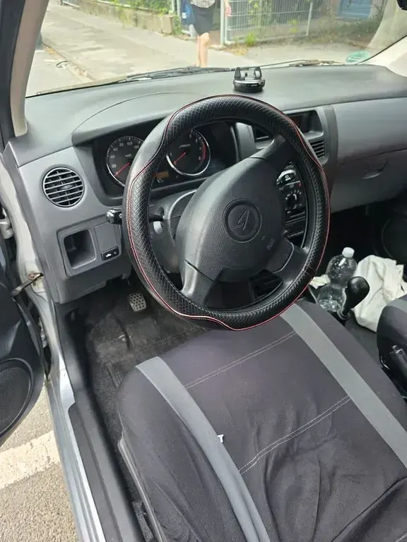 Gebraucht Daihatsu Cuore 58 PS (42 kW) 2006 Silber Kleinwagen