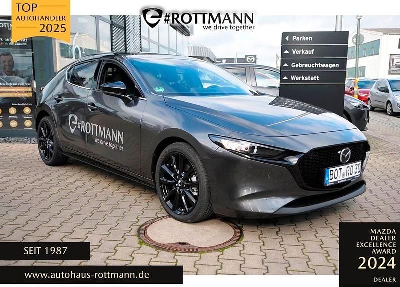 Grau Gebraucht 2024 Mazda 3 Homura-Line Limousine | 25.370 € (Teuer) - Bild 1/4