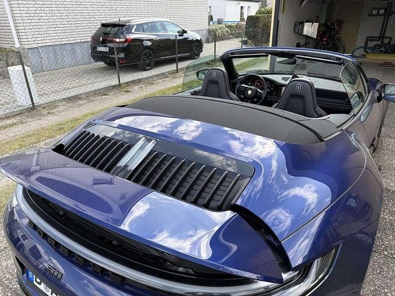 Gebraucht Porsche 992 480 PS (353 kW) 2023 Enzianblaumetallic Cabrio