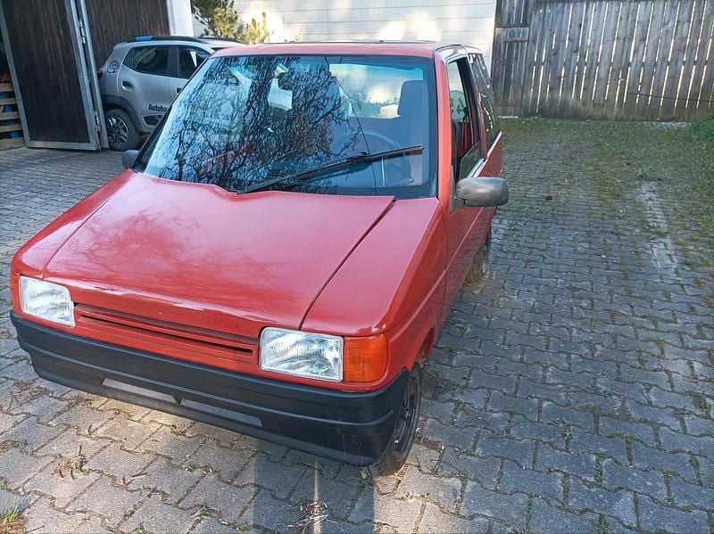 Begagnad Ligier Optima 1992 Röd Halvkombi