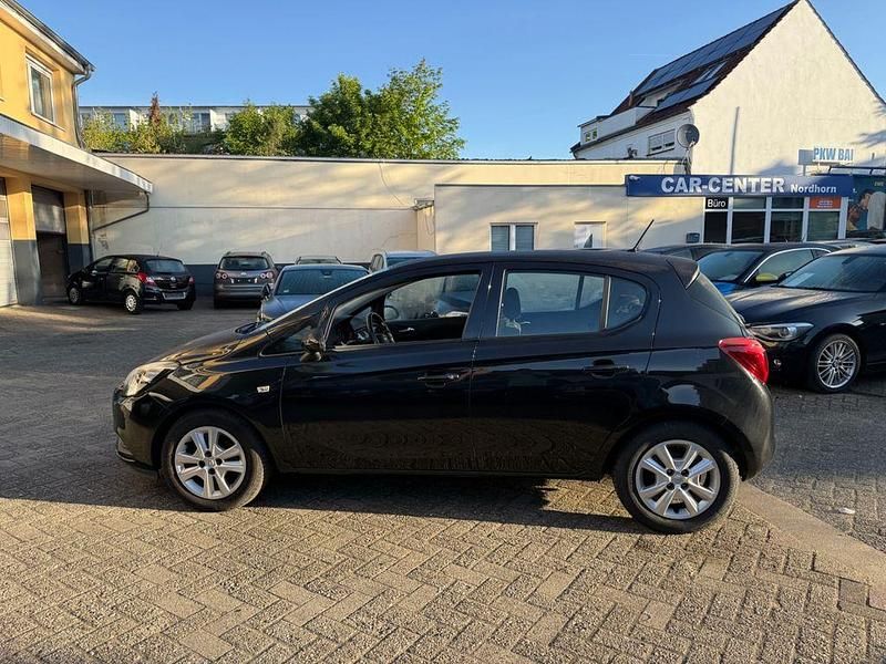 Używany Opel Corsa Edition 90 KM (66 kW) 2016 Czarny Sedan/Limuzyna