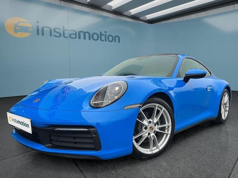 Blau Gebraucht 2023 Porsche 911 Carrera 4 Coupé | 125.849 € (Teuer) - Bild 1/4