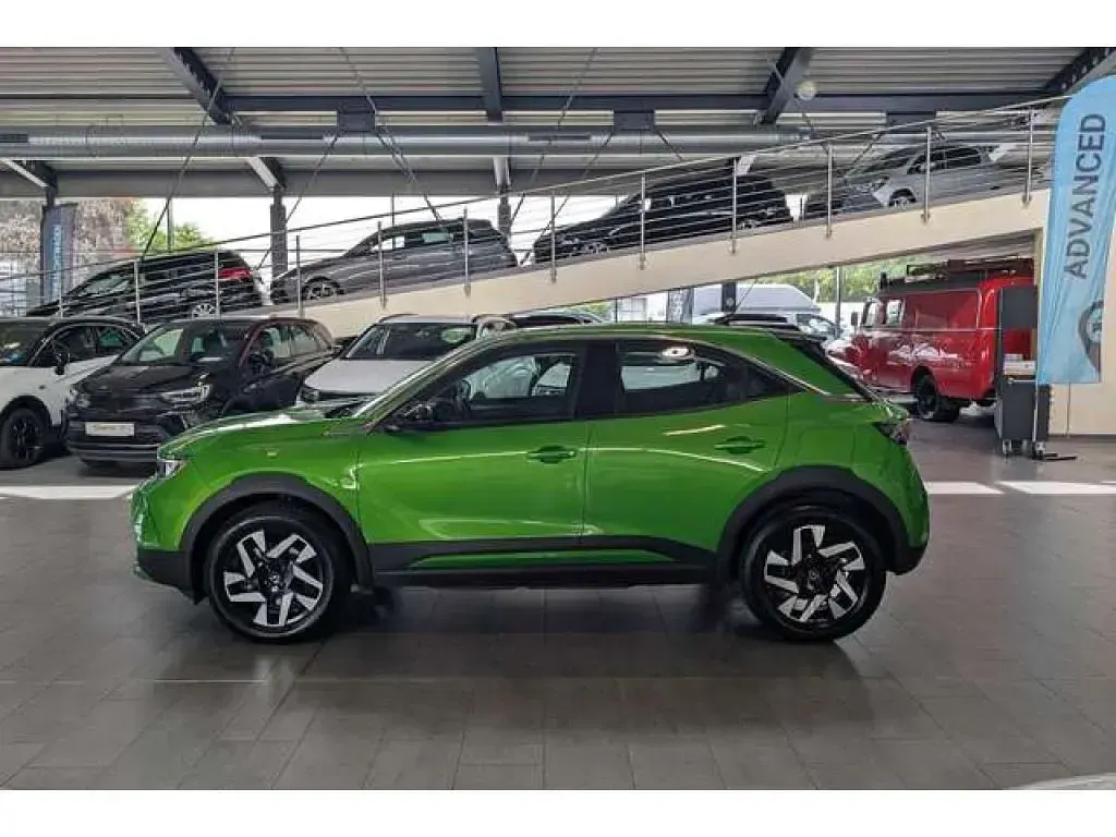 Gebraucht Opel Mokka-e Elegance 100 kW (136 PS) 2024 Matcha grün (metallic) SUV