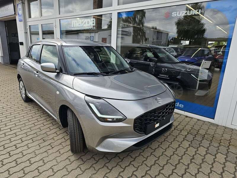 Silber Neu 2024 Suzuki Swift Club Kleinwagen | 16.990 € - Bild 1/4