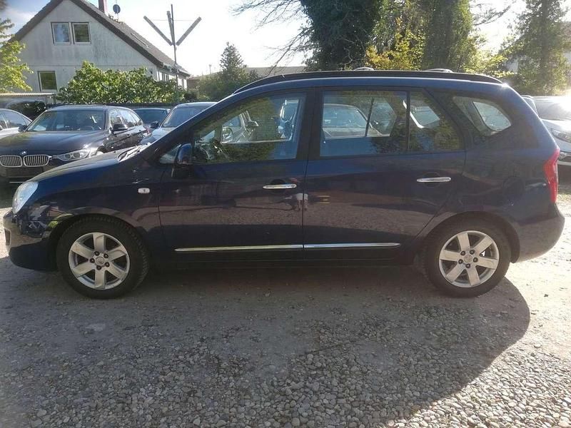 Gebraucht Kia Carens EX 144 PS (105 kW) 2009 Blau Van / Kleinbus