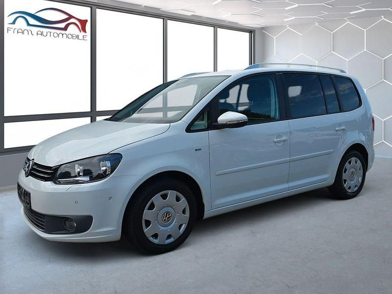 Weiß Gebraucht 2014 VW Touran Cup Van / Kleinbus | 10.985 € (Fairer Preis) - Bild 1/4