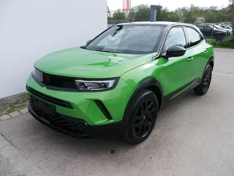 Gebraucht Opel Mokka 131 PS (96 kW) 2022 Matcha grün schwarz dach SUV