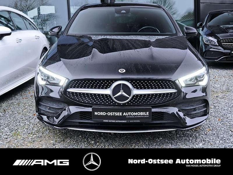 Gebraucht Mercedes CLA200 Shooting Brake AMG 163 PS (119 kW) 2021 Metalliclack kosmosschwarz Kombi