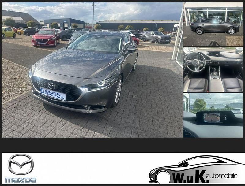 Grau Gebraucht 2022 Mazda 3 Exclusive-Line Limousine | 23.490 € (Fairer Preis) - Bild 1/4