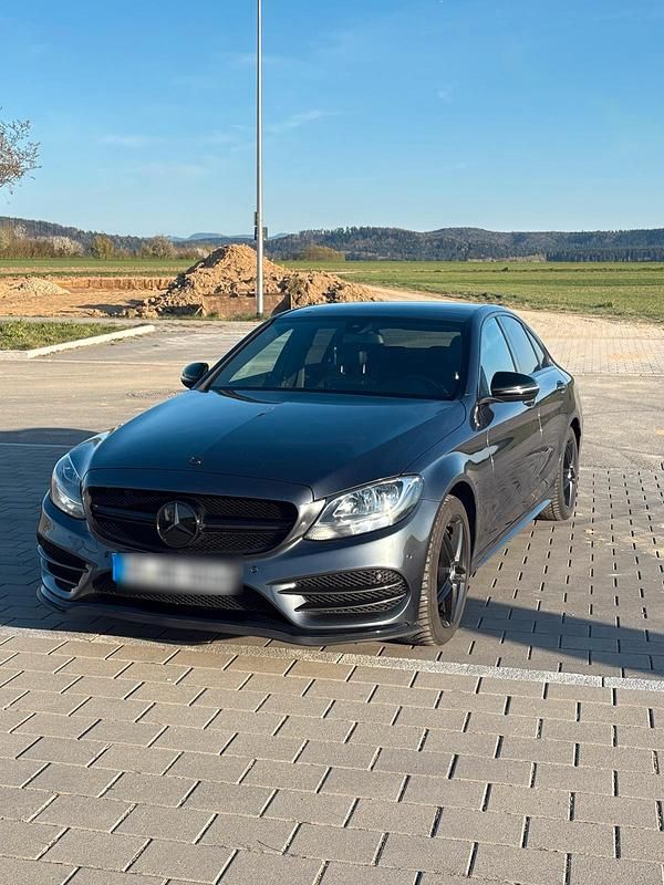 Grau Gebraucht 2015 Mercedes C250 Limousine | 24.000 € - Bild 1/4