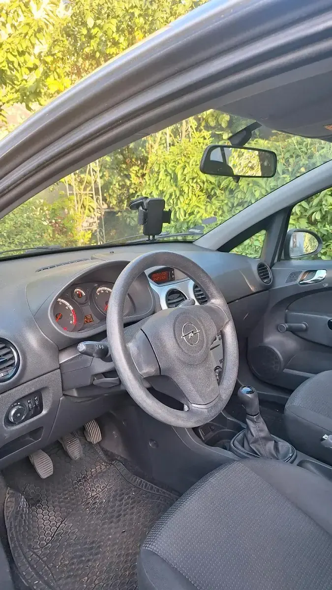 Gebraucht Opel Corsa 70 PS (51 kW) 2013 Silber Kleinwagen