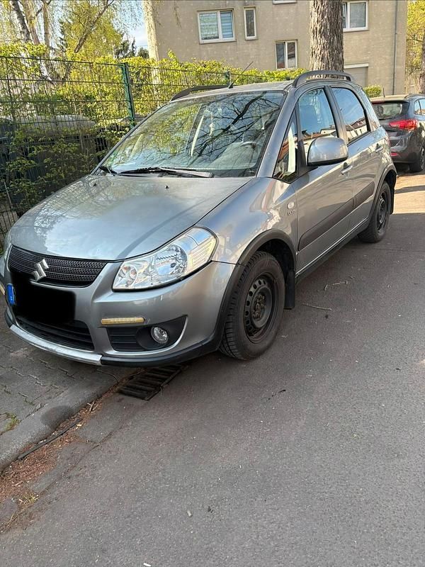 Usado Suzuki SX4 120 HP (88 kW) 2006 Cinzento Sedan